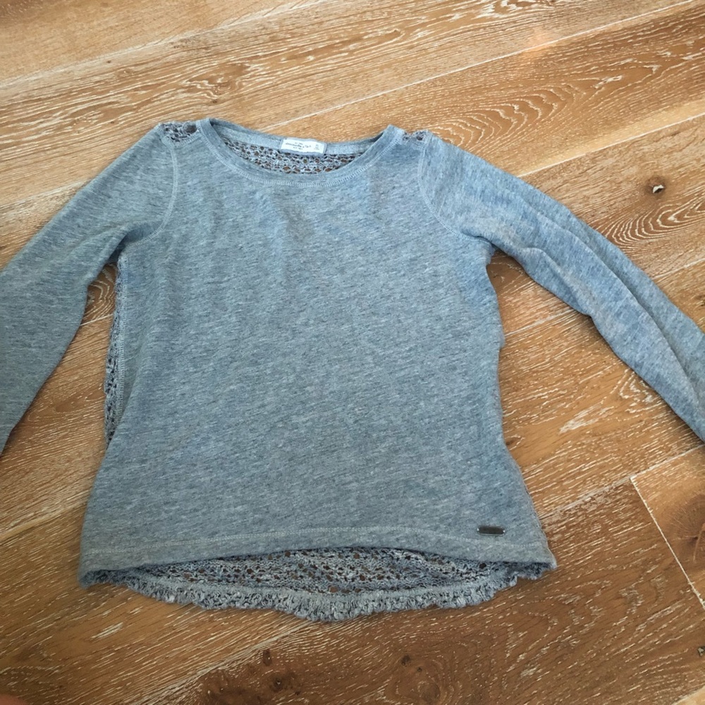 Gray sweater with detailed back